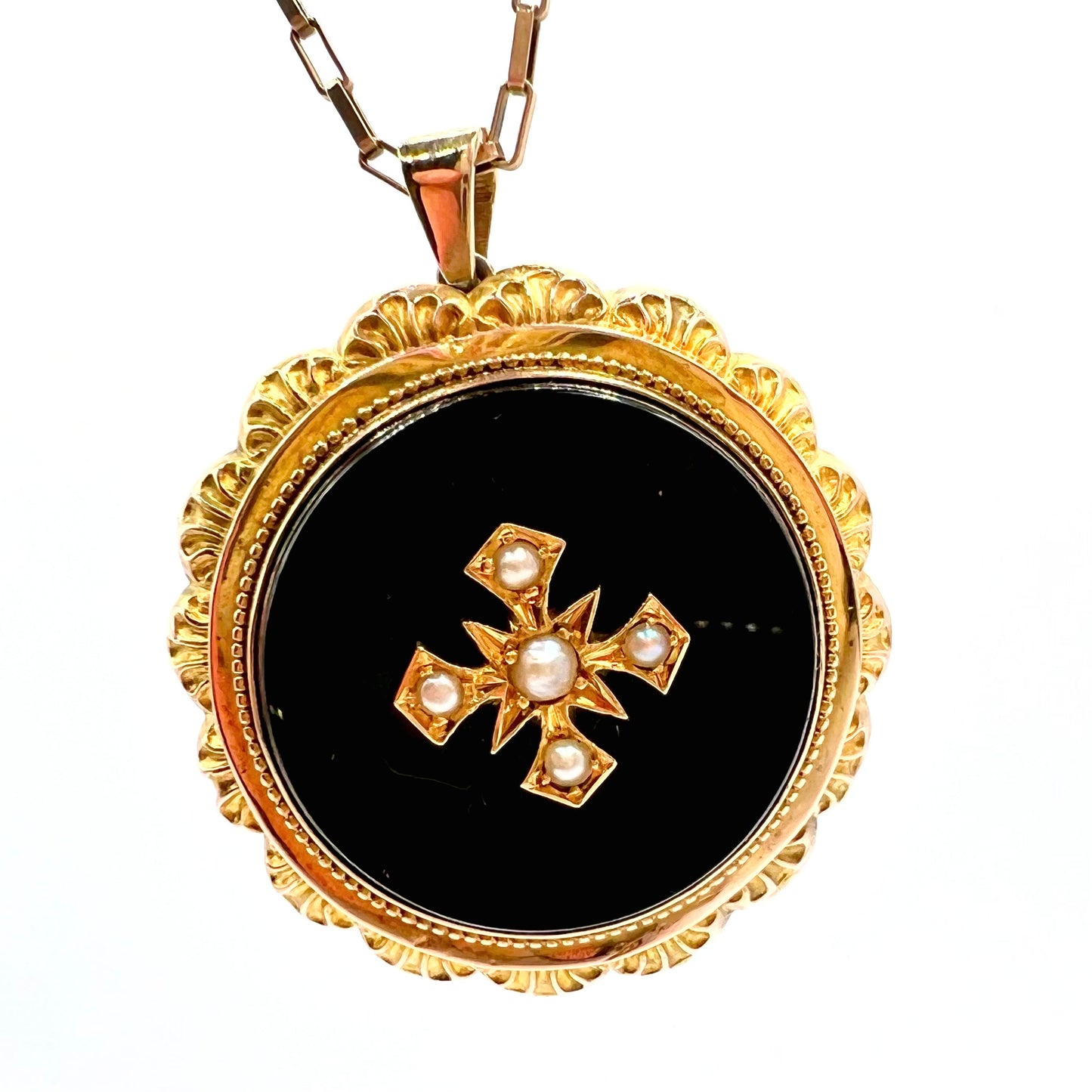 Victorian gold, pearl and black enamel round mourning picture locket