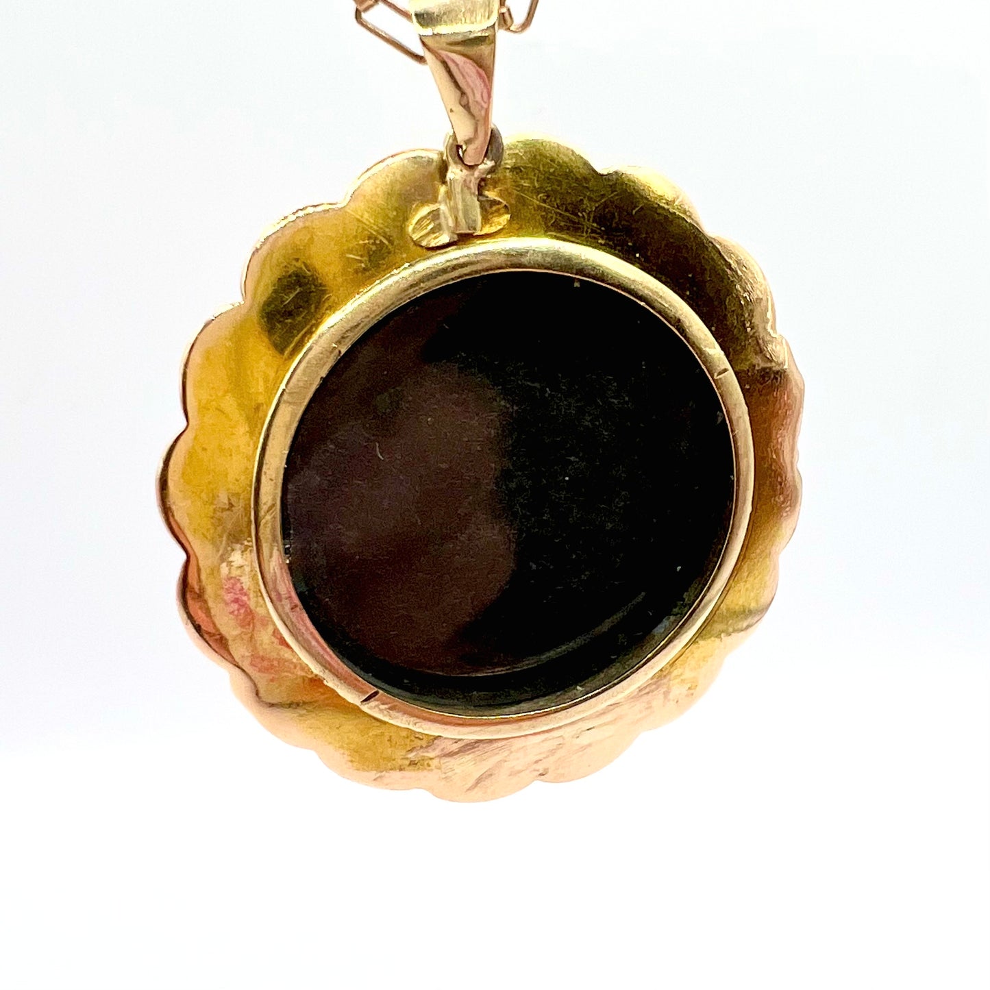 Victorian gold, pearl and black enamel round mourning picture locket