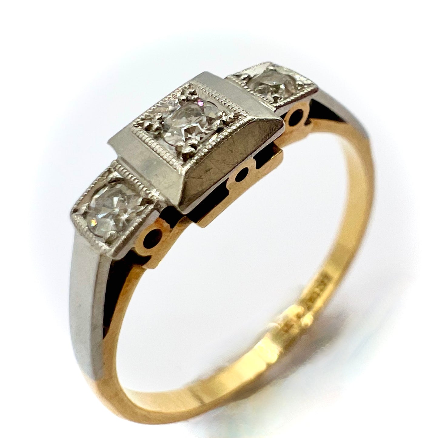 1920s Art Deco Platinum and 18ct gold trilogy engagement ring, size M